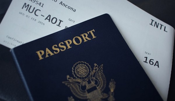 a passport on top of a piece of paper