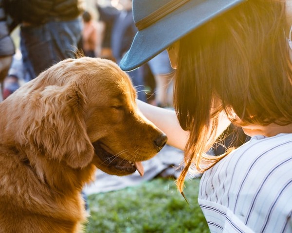 a woman with a dog