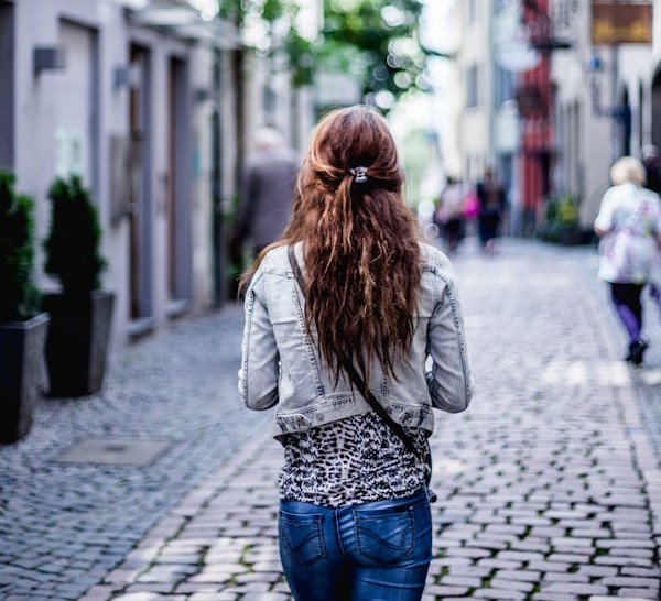 woman walking away